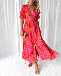 Robe longue rose imprimée à col en V