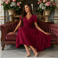 Robe midi portefeuille à manches bouffantes