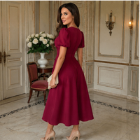 Robe midi portefeuille à manches bouffantes