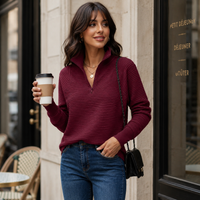 Pull côtelé à demi-zip et col montant