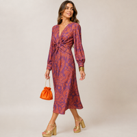 Long dress with twisted waist and V-neck