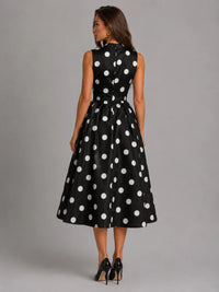 Robe midi à pois ceinturée
