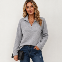 Pull côtelé à demi-zip et col montant