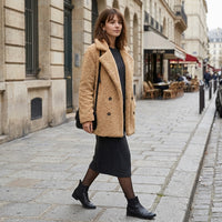 Veste courte en fausse fourrure effet mouton