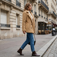 Veste courte en fausse fourrure effet mouton