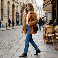 Veste courte en fausse fourrure effet mouton