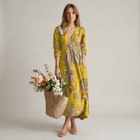 Robe midi à motif floral, col en V et poches