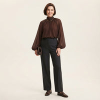 Blouse à manches bouffantes et encolure nouée