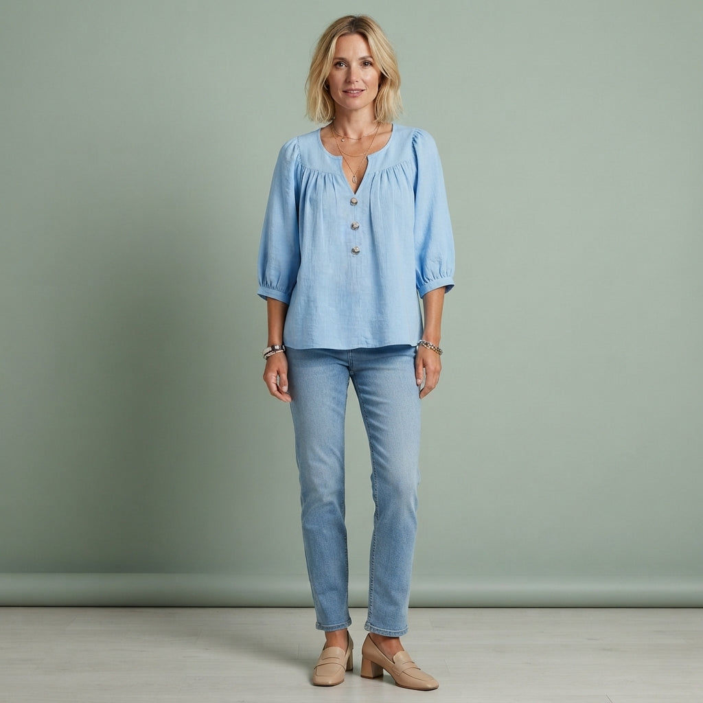 Blouse boutonnée à col en V et manches trois-quarts