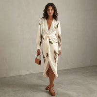 Robe midi portefeuille en satin à motif floral
