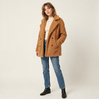 Veste courte en fausse fourrure effet mouton