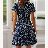 Robe courte portefeuille verte à fleurs