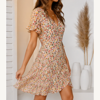 Robe courte portefeuille verte à fleurs