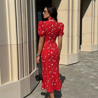 Robe midi fleurie à décolleté plongeant en V