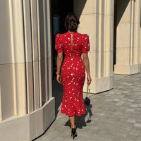 Robe midi fleurie à décolleté plongeant en V