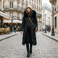 Manteau matelassé long à capuche bordée de fourrure