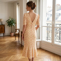 Robe midi fleurie à décolleté plongeant en V