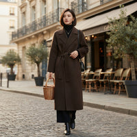Manteau long à revers ceinturé