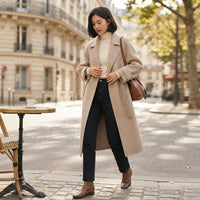 Manteau long à revers ceinturé