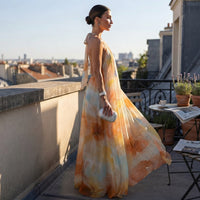 Robe maxi bohème dos nu à bretelles