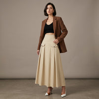 Jupe midi plissée taille haute
