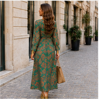 Long dress with twisted waist and V-neck
