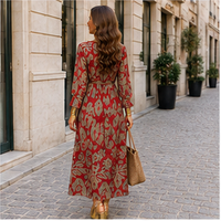 Long dress with twisted waist and V-neck