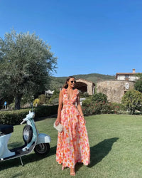 Robe longue à volants fleuris